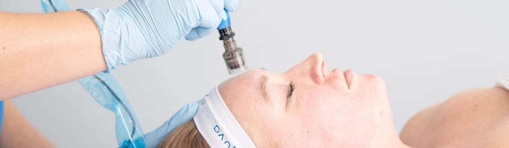 Aesthetic treatment with a syringe during a facial procedure at a luxury medspa in Brookhaven, GA.
